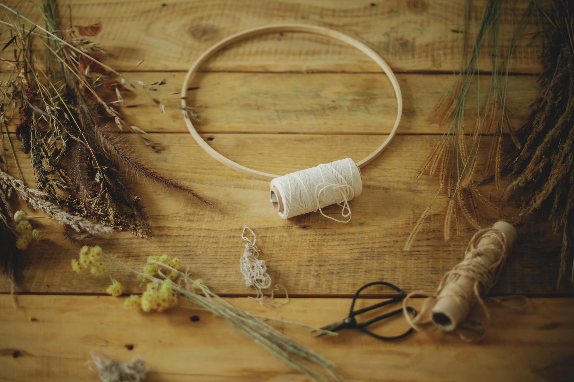 Artisan stitching embroidery hoop with threads